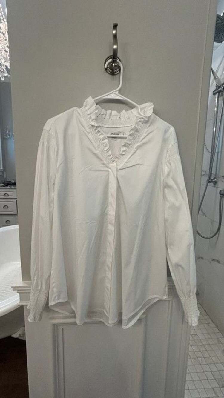 Long sleeve white blouse by Chico’s. Size 3